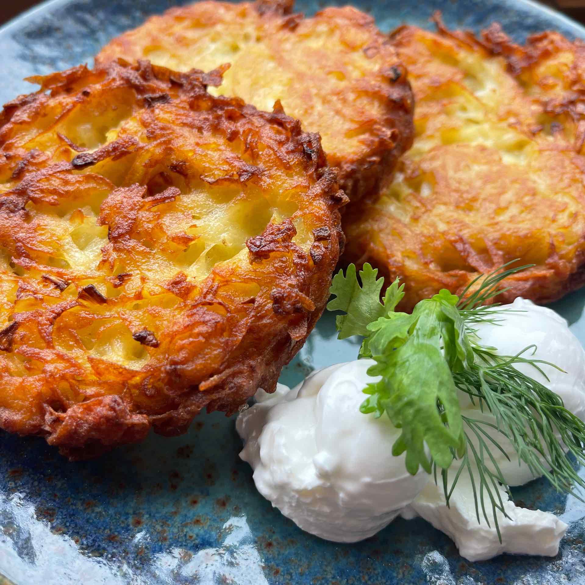 Draniki — potato pancakes with sour cream — In House Cafe Bar, Phuket